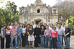 Group photo taken on the patio of the conference hotel